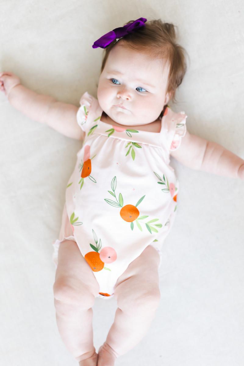 Tangerine Ruffle Cross Back Romper - 6